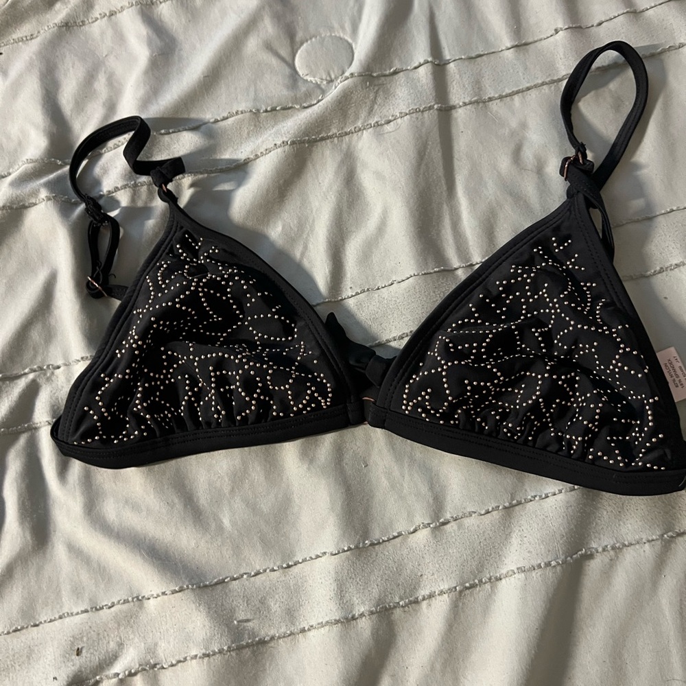 Black Triangle Bikini with Adjustable Straps and Intricate Pattern